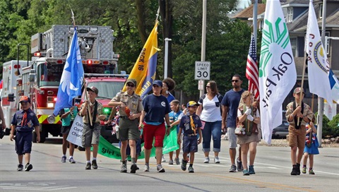 In this file photo, the Boys Scouts lead the 2019 Oak Park Fourth of July parade up Ridgeland Avenue. (Jeff Krage / Pioneer Press)