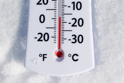 Image of a thermometer displaying frigid temperature.